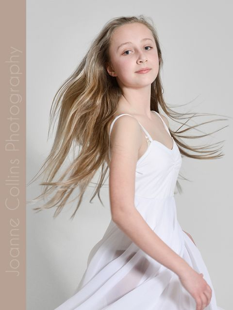 studio photographer kent dance model portfolio young teen in ballet dress with hair flowing