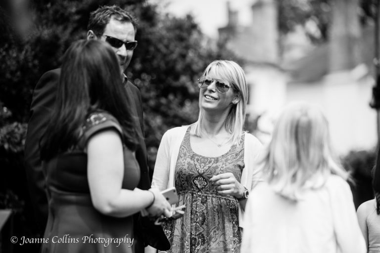 Christening Photographer Sevenoaks st thomas of canterbury church guests smiling