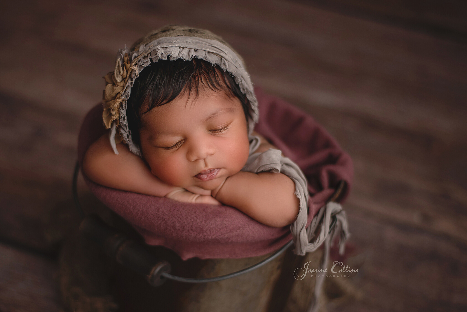 newborn photographer sittingbourne baby girl 9 days new in metal bucket