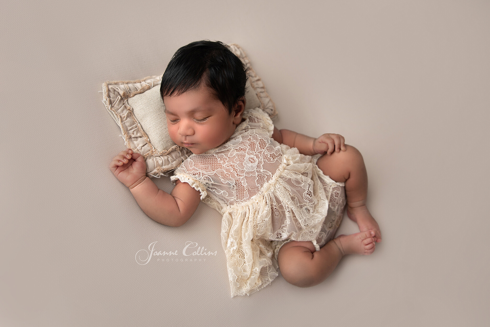 newborn photographer sittingbourne baby girl 9 days new in cute dress