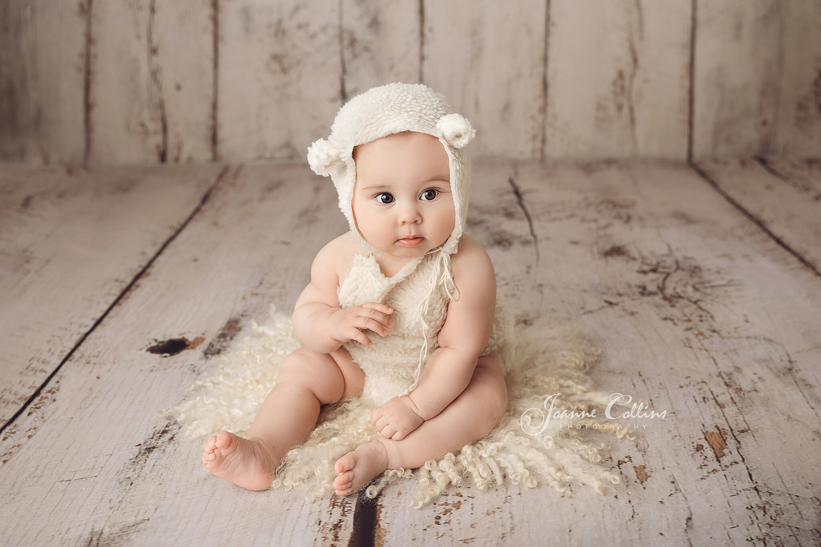 sitter photographer maidstone kent baby girl in cute baby lamb outfit