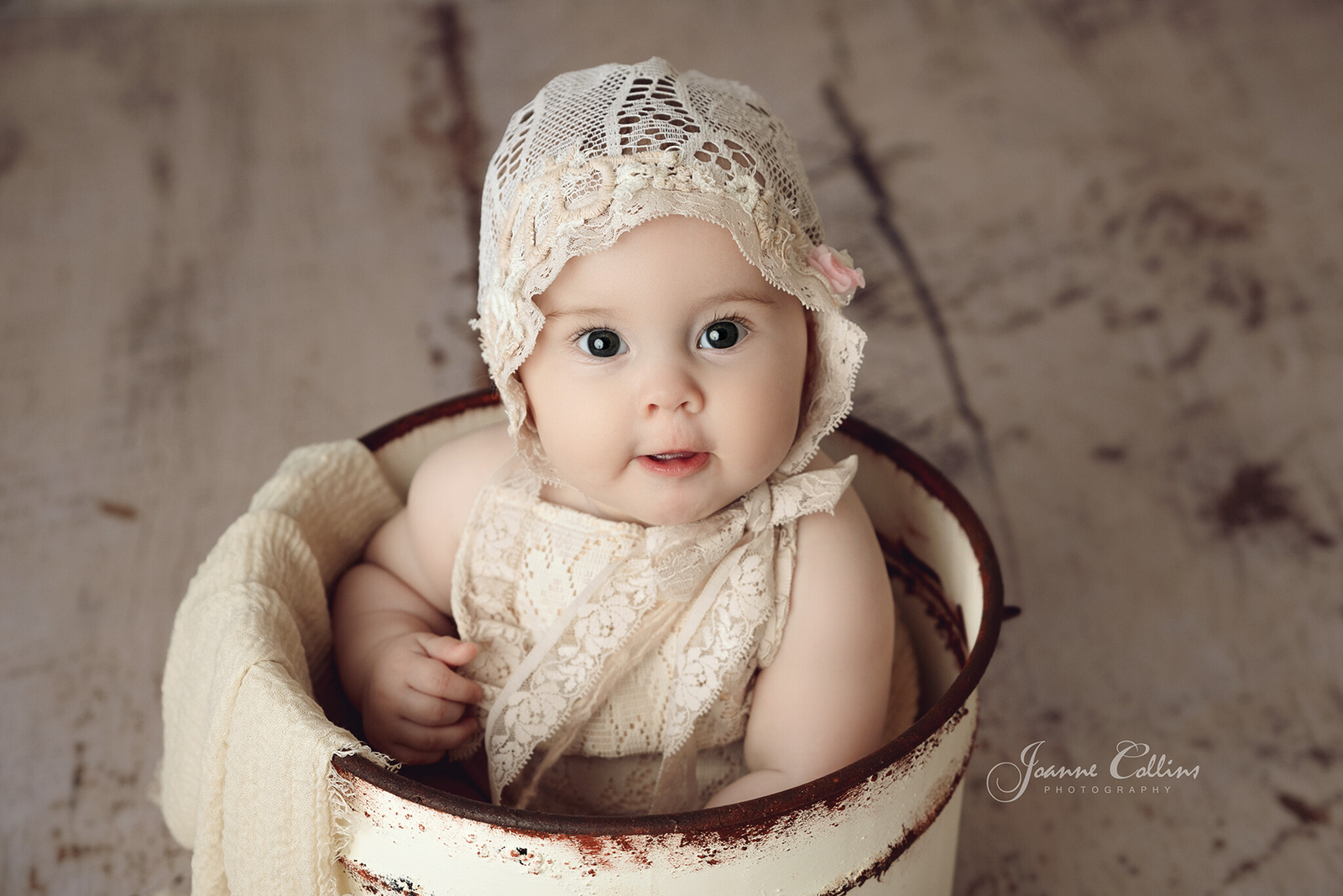 sitter photographer sittingbourne kent baby girl in cute vintage bonnet and romper set